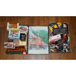 A good quantity of diecast models contained in two trays, both boxed and unboxed, by Corgi, Lledo,