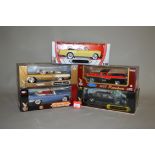 Three boxed 'Road Signature' 1:18 scale diecast models, a 1953 Packard Caribbean,