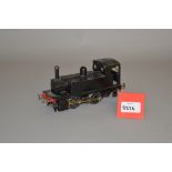 O Gauge. An electric kit-built 0-4-0 Pannier Tank locomotive in black.