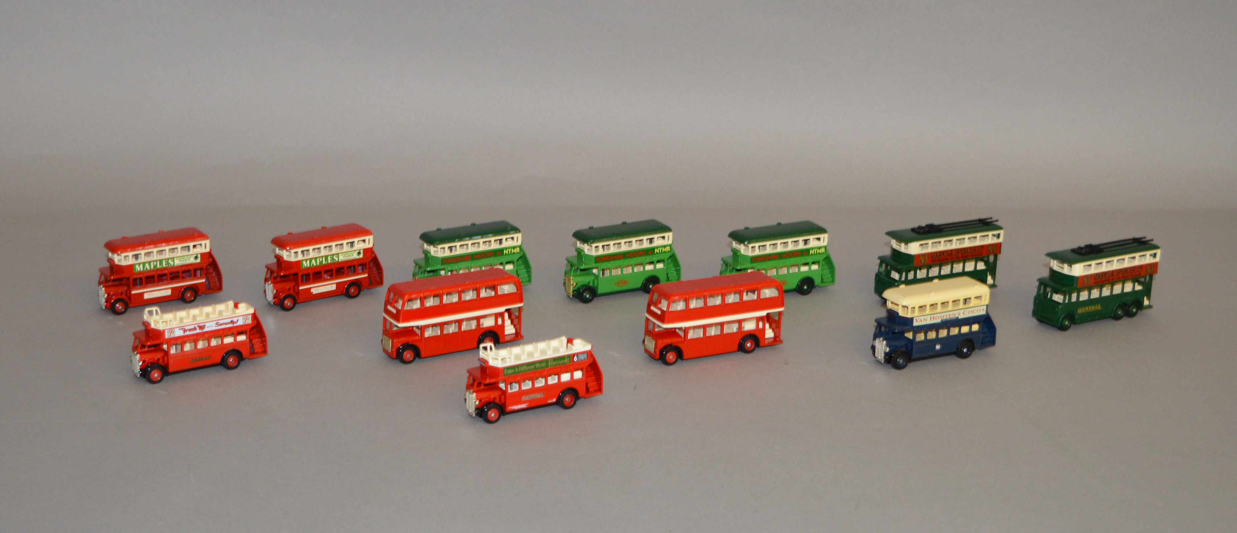 Twelve unboxed Lledo pre-production metal bus and trolleybus models,