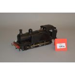 O Gauge. An electric kit-built 0-6-0 Pannier Tank locomotive in black.