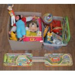 A very good quantity of tinplate, plastic and soft toys, mostly unboxed, contained in two boxes,