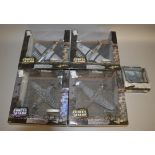 Four Unimax Forces of Valor 1:32 scale diecast model aircraft, together with another in 1:72 scale.