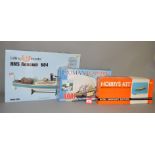 Three wooden model kits,