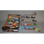 A very good quantity of playworn Corgi Toys diecast models, some with repainting,