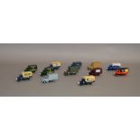 Twelve unboxed Lledo pre-production metal and plastic DG28 Mack Canvas-Back truck models,