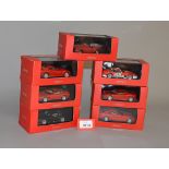 Seven boxed IXO Ferrari diecast model cars in 1:43 scale including 125S,