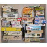 34 x plastic model kits by Aurora, Airfix, Revell and others.