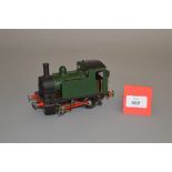 O Gauge. An electric kit-built 0-4-0 Pannier Tank locomotive in green/black.