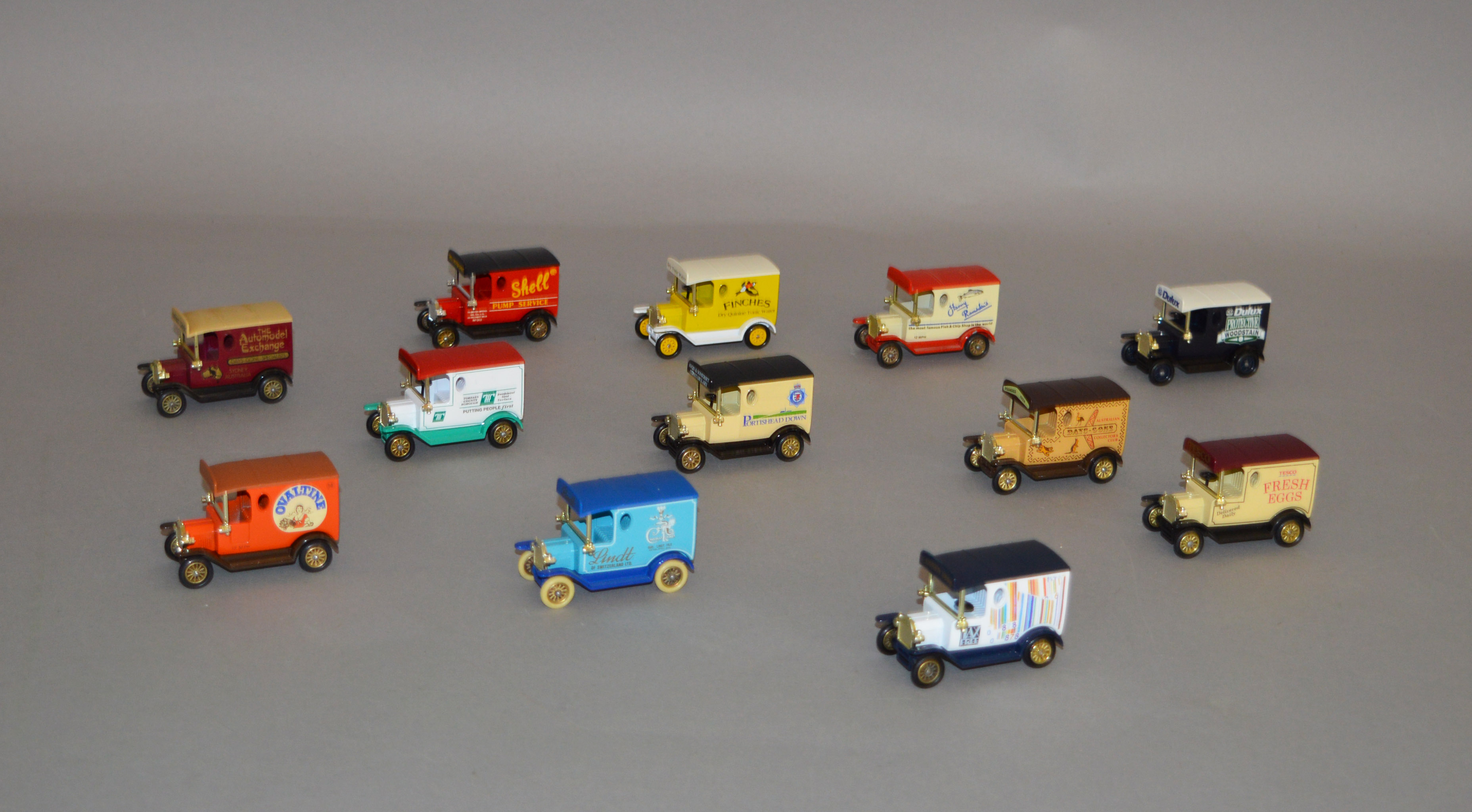 Twelve unboxed Lledo pre-production metal and plastic DG6 Model T Ford Van models,