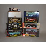 Eight boxed diecast model cars in 1:18 scale by Revell, Bburago,