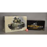 Two radio control tanks: SOS Snow Leopard 1:16 scale Smoking Tank;