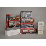 Ten boxed diecast truck models by Maisto, New Ray, First Gear and others,