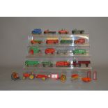 Twenty two unboxed playworn Dinky Toys diecast, mostly farm related and commercial vehicle,