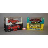 Four boxed diecast Ferrari model cars in 1:18 scale, an Anson 246GT,