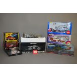 Seven boxed diecast models by Corgi, Minichamps and others including two Fire Engine models,