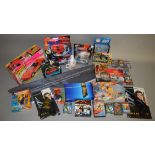 A good quantity of James Bond related items including boxed and carded diecast models by Johnny