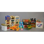 A mixed group of boxed diecast models by Lledo, Corgi, Bburago and others,