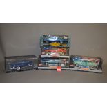 Five boxed ERTL diecast model cars in 1:18 scale from their 'American Muscle Collectibles' range