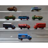 Nine unboxed Lledo Vanguards pre-production metal van, truck and tanker models,