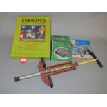 A mixed lot including a vintage 'Kelo-Pogo Jetace' metal Pogo Stick,