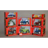 Eight Britains 1:32 scale diecast agricultural models. All boxed and E.