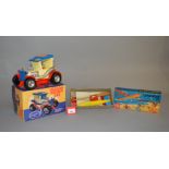 Two plastic toys: Vibrating Antique Car, G in F box; Gunther Flug-Spiel Turboplan 32, G+ in G box.