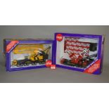 Two Siku 1:55 scale diecast models: 4310 Latticed Mast Crane; 4810 Heavy Mobile Crane.