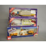 Three Siku 1:55 scale diecast models: 4019 Low Loader with Car Wash Equipment;