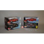 Four boxed Hot Wheels diecast models in 1:18 scale, a 250GT,