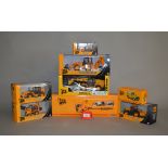 Eight JCB diecast models,