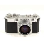 Nikon S 35mm Rangefinder Camera. #1609689, slight wear to rear (condition 5F).