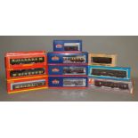 OO gauge. 11 x boxed coaches by Bachmann, Hornby, Lima and Airfix. Boxed and appear VG.