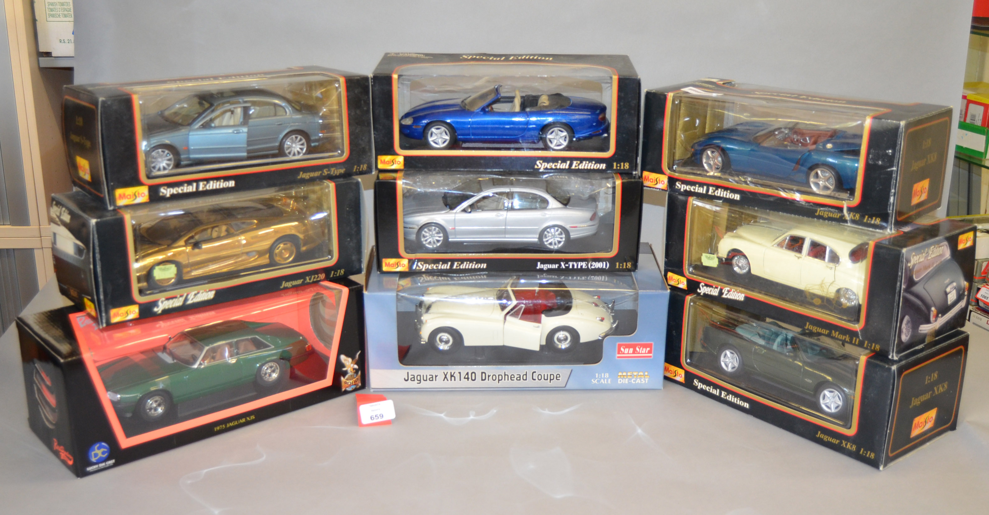 Nine 1:18 scale diecast Jaguar model cars by Maisto, SunStar and Road Signature, including X Type,