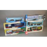 Five boxed diecast 1:50 scale truck models by Cararama, Eligor etc.