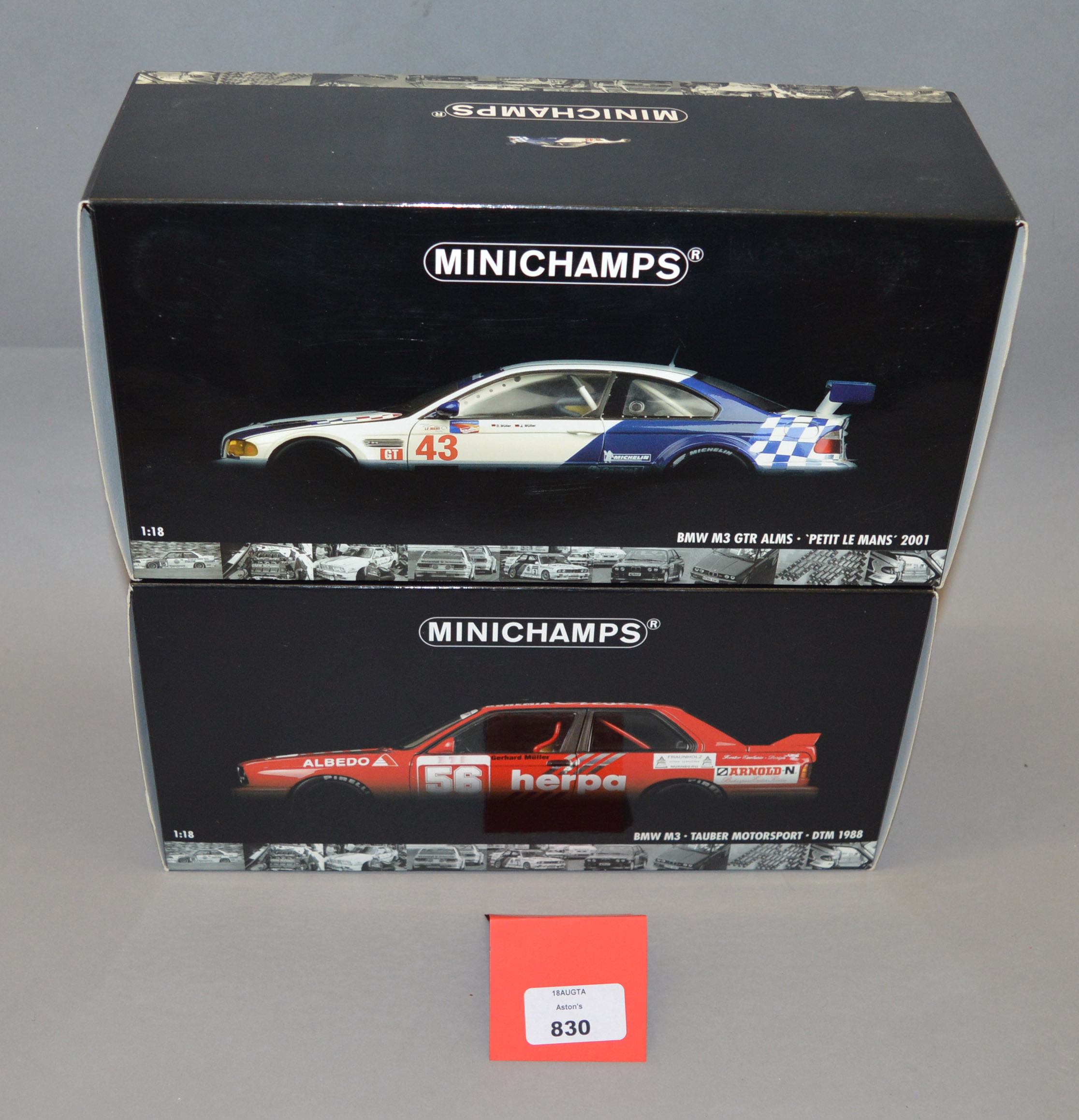Two boxed BMW M3 diecast model cars in 1:18 scale,