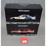 Two boxed BMW M3 diecast model cars in 1:18 scale,