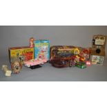 A Good selection of Tin-Plate and battery operated toys, including a Welsotoys Police car.