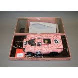 A boxed Minichamps diecast model car in 1:18 scale,