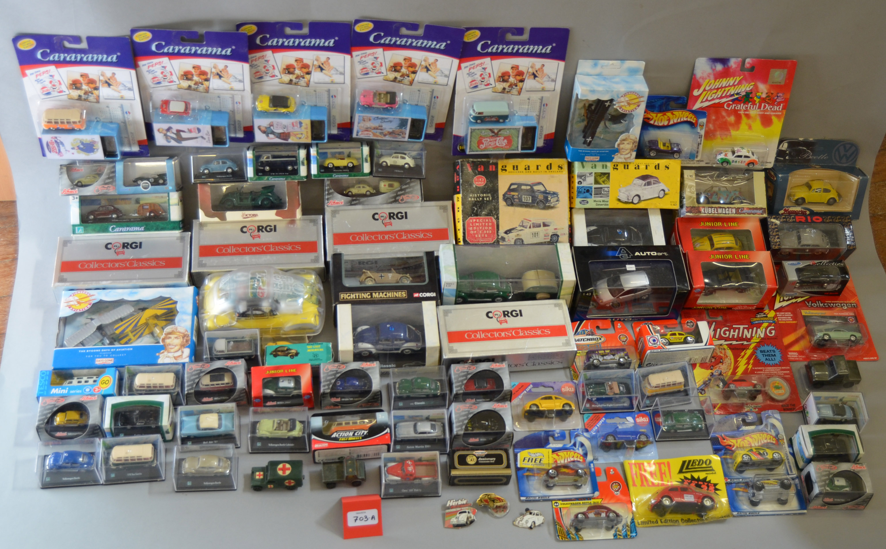 A good quantity of boxed and carded diecast models by Cararama, Lledo, Schuco and others,