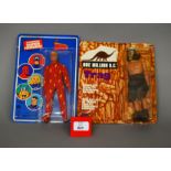 Two Mego action figures: One Million BC Trag, E (but grey face),