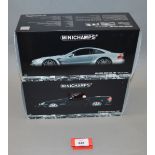 Two boxed Minichamps Mercedes Benz diecast model cars in 1:18 scale,