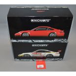 Two boxed Porsche 911 GT3 RSR (2004) diecast model cars in 1:18 scale,