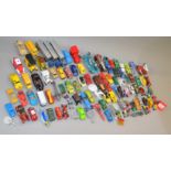 A good quantity of unboxed playworn diecast models by Matchbox, ERTL, Siku and others,