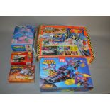 Quantity of 1990s boys toys: Tyco Crash Robots Crash Test Center; Galoob Z Bots Fang Fighter;
