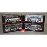 Four Minichamps 1:18 scale diecast model cars: Audi TT 2006; Mercedes-Benz R-Class 2005;