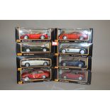 Eight Maisto 1:18 scale diecast model cars, including Jaguar and Audi. Boxed and E.