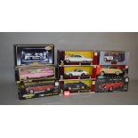 Eight 1:18 scale diecast model cars by Welly, Saico, ERTL, etc.