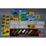16 x boxed Vanguards diecast models, together with another eight models on a plinth,