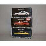 Three Minichamps 1:18 scale diecast model cars,